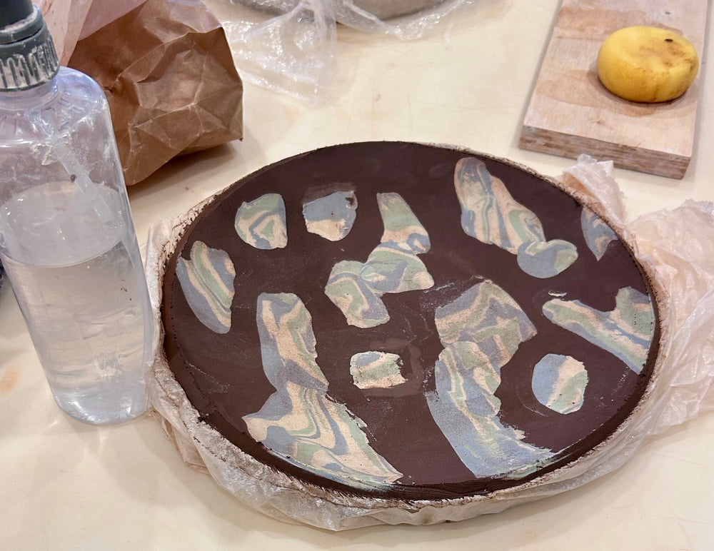 Shaping the plate within a mold